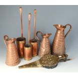 Three copper and brass graduated ale measures, inscribed 1L, 1/2, 1/4, a set of three J.S. & S.
