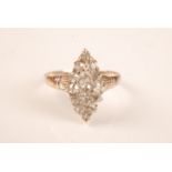 A Victorian diamond marquise form pave set ring in heart shaped box.