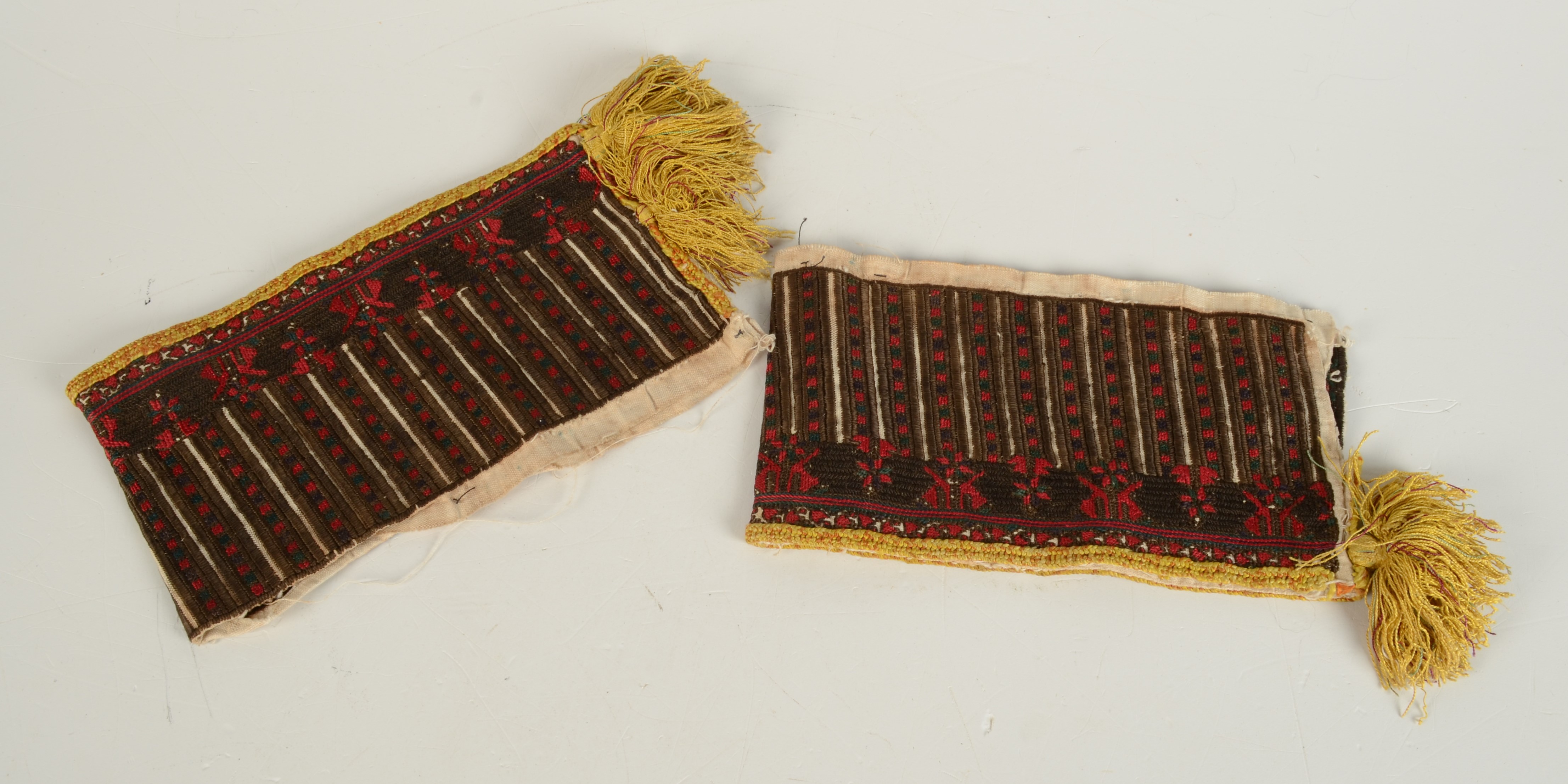 A pair of middle eastern hand made silk robe cuffs, 21 x 12cm.