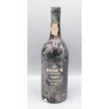 A bottle of Dows 1985 vintage Port, height 29cm.