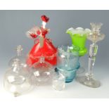 A Venetian glass figure of a lady, height 33cm, three glass fly traps and miscellaneous glassware.