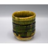 A Ken Matsuzaki Studio Pottery sake cup, with a green lustre glaze, height 6.4cm, diameter 5.