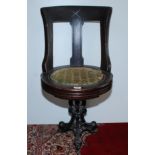 A late 19th century walnut ship's swivel dining chair,