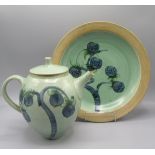 An Alan Brough studio pottery teapot, height 22.3cm, and a matching charger, diameter 33cm.