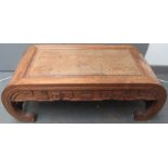 A Chinese hardwood Kang table, with a rectangular burr wood inset top,