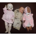Two all composition baby dolls and a plastic Mama doll by Pedigree.