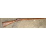 A possibly Indian reproduction percussion cap rifle with a hardwood stock and steel barrel,