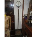 A cast iron platform balance to weigh 20 stone, the circular dial marked Shanks & Co. Ltd.