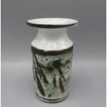 An Adam Dworski Wye Pottery vase, with a flared rim and cylindrical body with abstract designs,