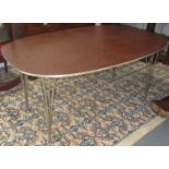 A Piet Hein & Bruno Mathsson extendable brown Super-Ellipsis dining table, circa 1969,
