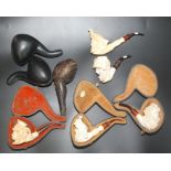 Six meerschaum pipes, one with attached sticker inscribed 'Meerschaum Koncak Eskisehir Turkey'.