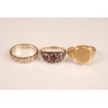 A 18ct gold signet ring ad two other rings. Condition report: Weights per carat.