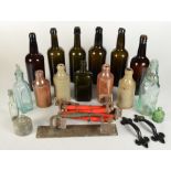 Six blob necked coloured bottles, miscellaneous stoneware bottles, door handles, etc.
