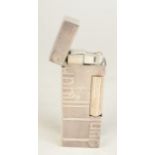 A silver coloured Dunhill Signature gas Swiss made Rollagas lighter serial 33539 boxed with booklet