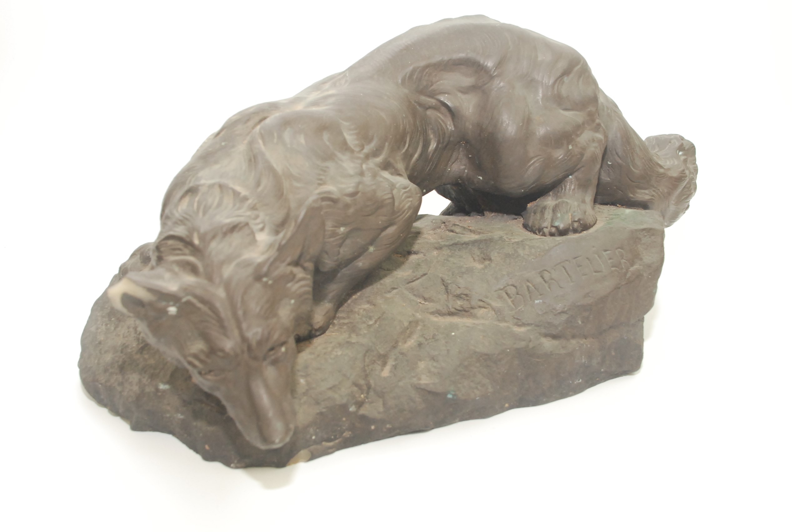 A bronzed resin model of a prowling fox, after Bartelier, height 17.5cm, width 40cm.