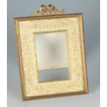 A late Victorian gilt metal and embroidered photo frame, height 26.7cm, width 19.