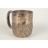 A late Victorian half spiral fluted silver Christening mug, Sheffield 1891. 5.8oz.