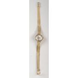 A ladies Ancora 18ct gold cased wrist watch on 18ct gold strap, 17.7g.