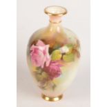 A Royal Worcester porcelain baluster vase, signed F.J. Bray, painted with roses, height 20cm.