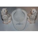 A pair of Staffordshire pottery spaniels, 20th century,