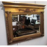 A reproduction gilt decorated rectangular wall mirror, height 103cm, width 130cm.