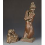 A bronzed resin figure of a naked lady, signed Alec Wiles,