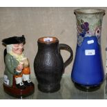 Doulton character jug 'Happy John', together with Doulton stoneware leather pattern 'Black Jack'