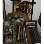 A wooden magazine rack, with contents of prints, wall light, pair of barley twist candlesticks and