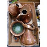 A set of copper measuring jugs, together with copper spittoon