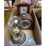 A clock under dome, together with two other mantel clocks and a selection of keys