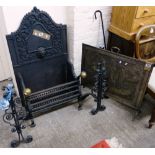 A cast iron inset fire, complete with cast iron back together with brass fire screen