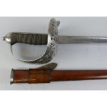 An Edward VII British infantry officers pattern 1897 sword, the ornately chased 82cm steel blade