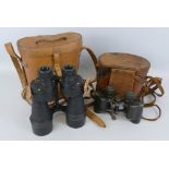 A pair of Ross London binoculars, marked Bino. Prism No.5 Mk II No.92076, in leather carrying case