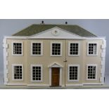 A scratch built wooden doll's house, of Georgian double fronted two storey form, with simulated