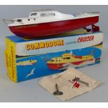 A Sutcliffe clockwork model boat - Commodore Cruiser, 32cm, boxed with original packaging