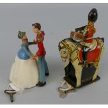 Wells Brimtoy - clockwork tin-plate military drummer on horseback, 15cm high and clockwork plastic