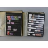 A collection of GB stamps contained in two ring binder stock books, from 1840 through to modern