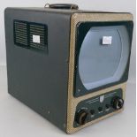 A 1950's Ekcovision Type TMB272 portable television receiver, 26cm wide, 35cm high, 40cm deep