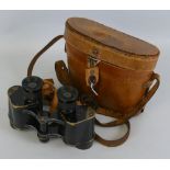 A pair of Bausch and Lomb 6x30 Military Stereo binoculars, in calf leather carrying case. These