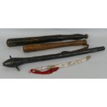 An ebonised turned harwood truncheon with ribbed grip, gilt VR cypher and impressed number 123