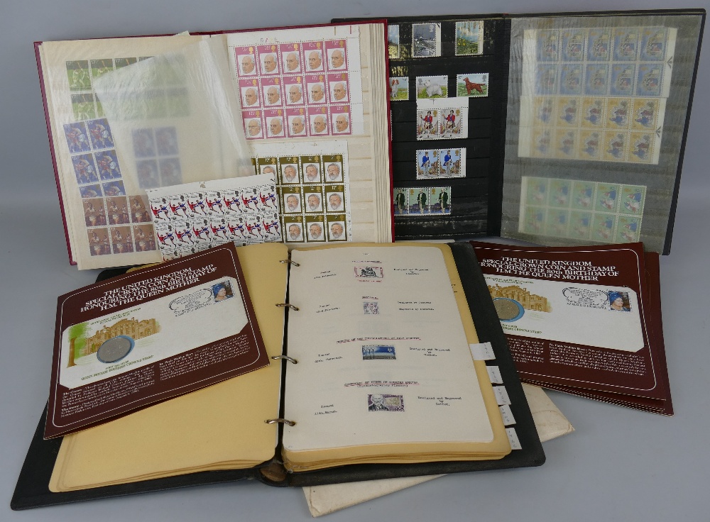 Large quantity of mint GB QEII stamps, individual and in various sized blocks, contained in two