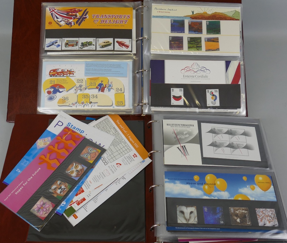 Two albums of modern Royal Mail Presentation Packs, containing a high total value for postal use
