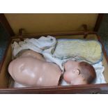 An Armand Marseille bisque head baby doll (dismantled), marked AM Germany 351.8.K in suitcase