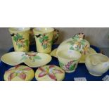 A collection of Carlton ware, including butter dish, mugs, sugar pot, milk jug etc