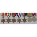 Seven WWII medals, comprising 1939-45 and Defence Medals and France and Germany, Burma, Africa,