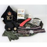 Military equipment, including shoulder rank slides, cloth badges, two stable belts, RCT Military