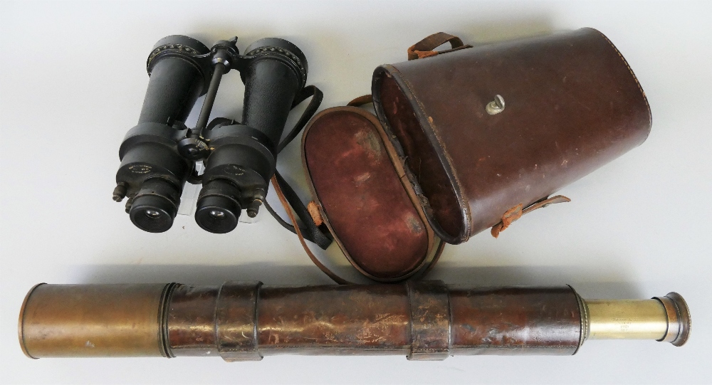 A Boer War period brass and leather artillery spotting two-draw telescope, inscribed "Clarkson and