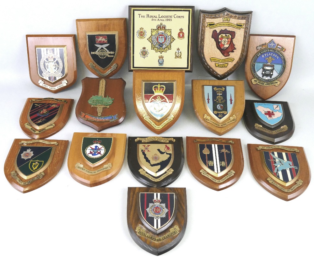 Sixteen military wall plaques, including the Royal Logistics Corps, 40th Commando Royal Marines, etc