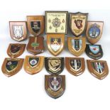 Sixteen military wall plaques, including the Royal Logistics Corps, 40th Commando Royal Marines, etc