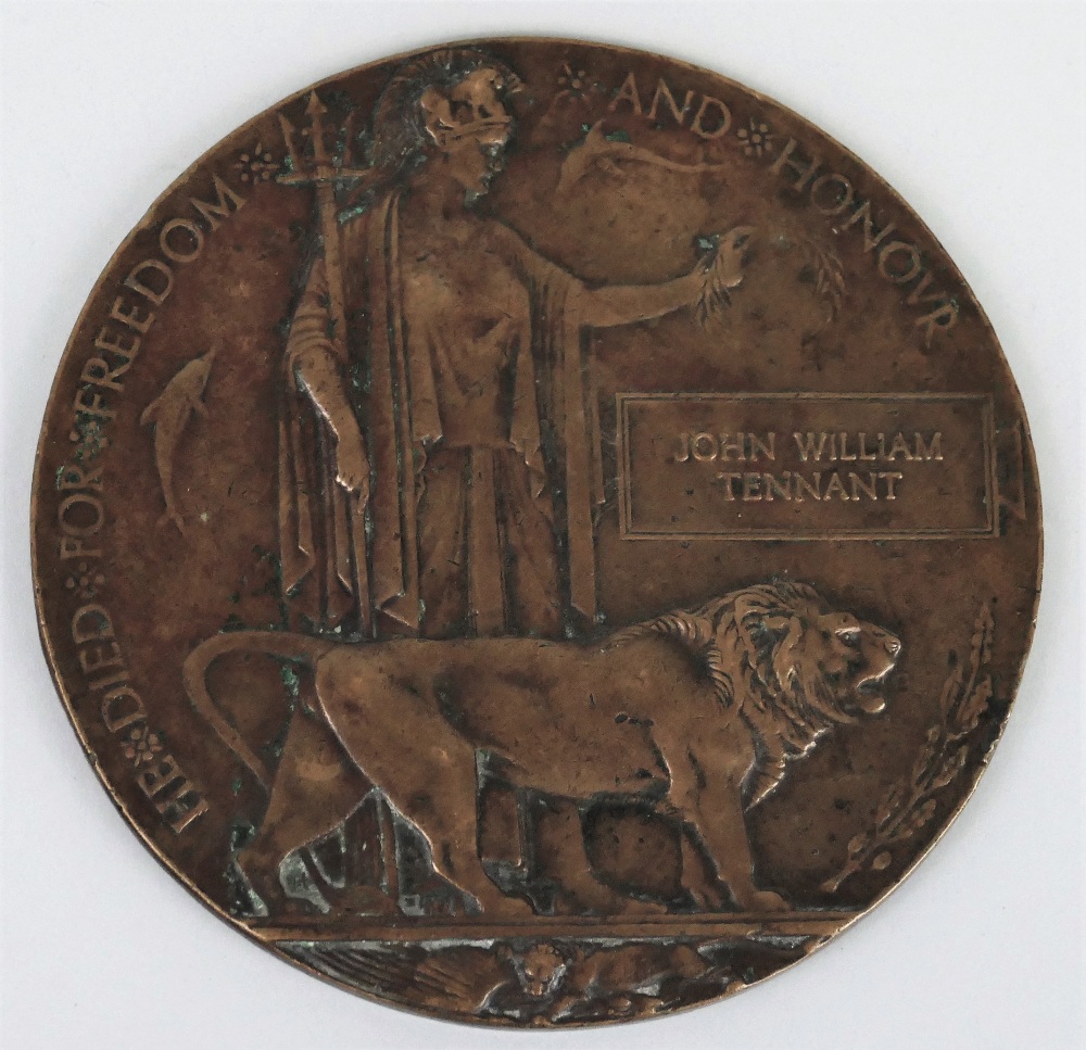 A WW1 bronze memorial plaque, for John William Tennant. John William Tennant was a crew member on